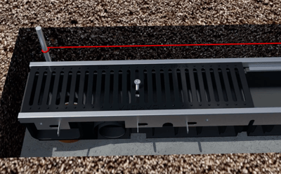 installazione-della-griglia-carrabile-per-canalette-in-plastica